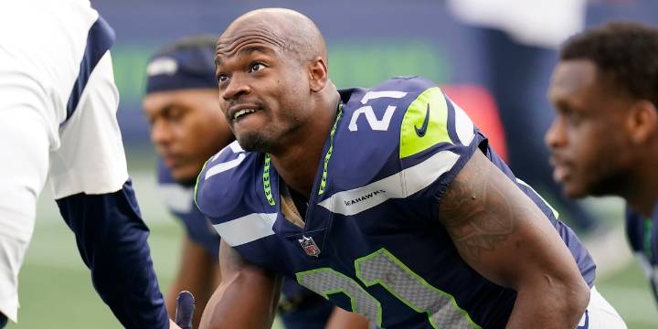 Former NFL star Adrian Peterson arrested in Houston suburb