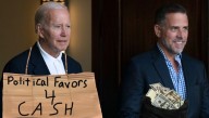 DOJ Finds No Evidence Of Bribery In Photo Of Biden Holding Sign Reading ‘Will Trade Political Favors 4 Cash’