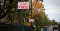 England flags taken down in Nottingham and replaced by 'we are welcoming' signs