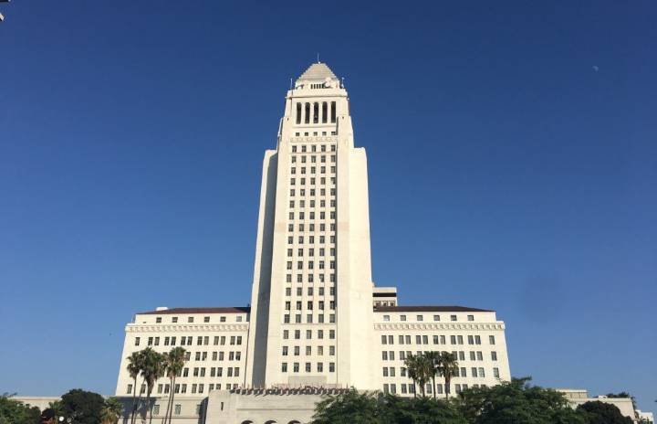 Driver crashes into steps of L.A. City Hall, is barricaded in car, then surrenders