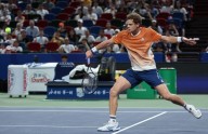 Tennis-Sinner retires with cramp in Shanghai, Djokovic advances in ‘brutal’ conditions