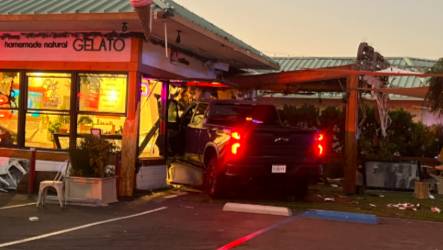 Child hurt after car crashes into North County ice cream shop
