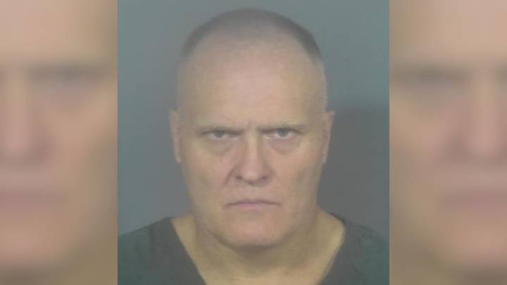 Man arrested after allegedly setting house on fire with family inside