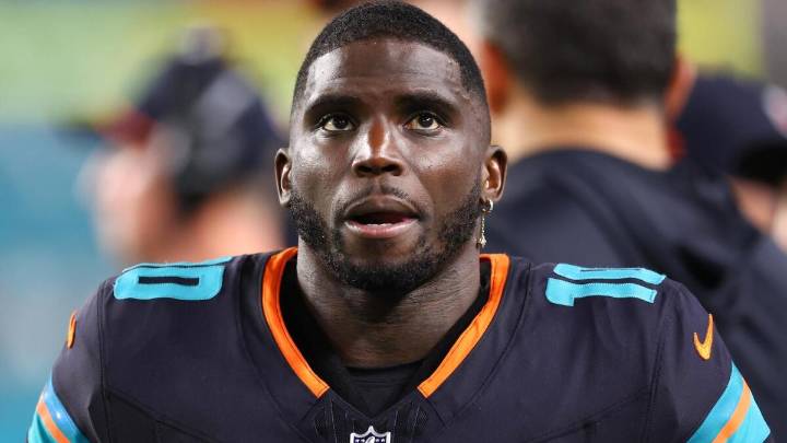 Dolphins' Tyreek Hill explains his unique reaction to graphic knee injury and why he's unsure of NFL future