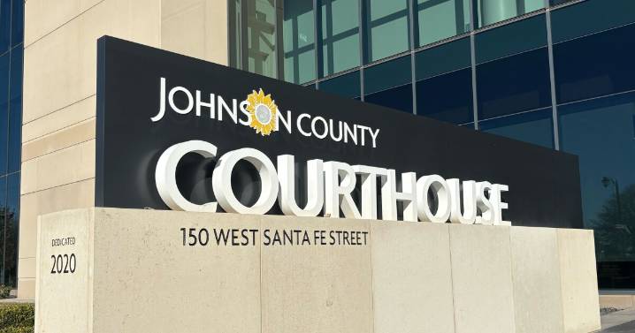 Kansas courts can extend probation for people who can’t pay fines. A lawsuit says that's unfair