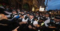 Police battle protesters shouting 'death to the IDF' as 40 arrested in UK demo chaos