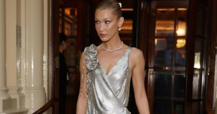 Bella Hadid’s London Photos in Slinky Ruffle Dress Has Fans Calling It ‘Iconic'