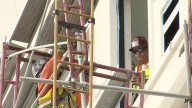 Crews continue to work on scaffolding, leaving East Commerce St. closed amid busy weekend downtown