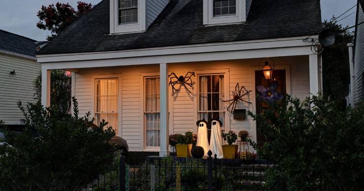 A gloomy historic cottage becomes a charming Uptown home. The porch and kitchen are its stars.