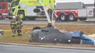 Small plane crashes on highway in southern Massachusetts