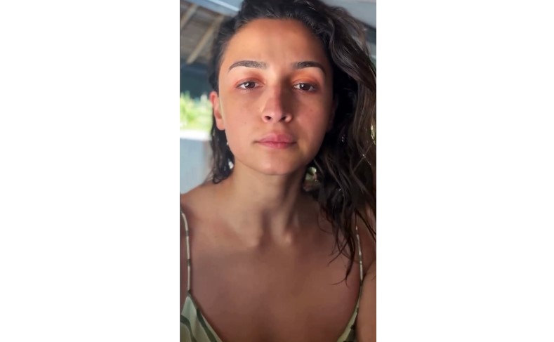 Alia Bhatt flaunts a perfect hair flip while doing her makeup