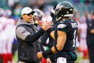Former Eagles coach fined $100,000 for sideline outburst with player