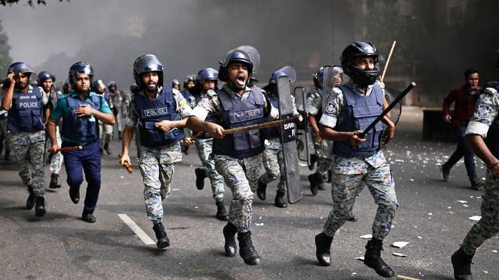 Clashes break out near Bangladesh parliament as major parties sign a roadmap for change