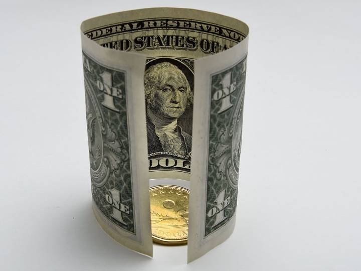 Canadian dollar forecasts cut as economy loses steam