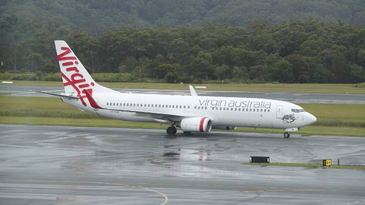Virgin Australia announces new one-bag limit for economy flyers in bid to speed up boarding and boost efficiency