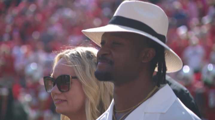 Ex-Virginia running back honored at UofL game after remarkable recovery from spine injury