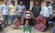 Illegal Alcohol Bust in Nanakramguda: Couple Arrested with 10 Liters of Bootleg Liquor