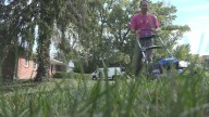 Volunteers getting their hands dirty to help Des Peres family battling cancer