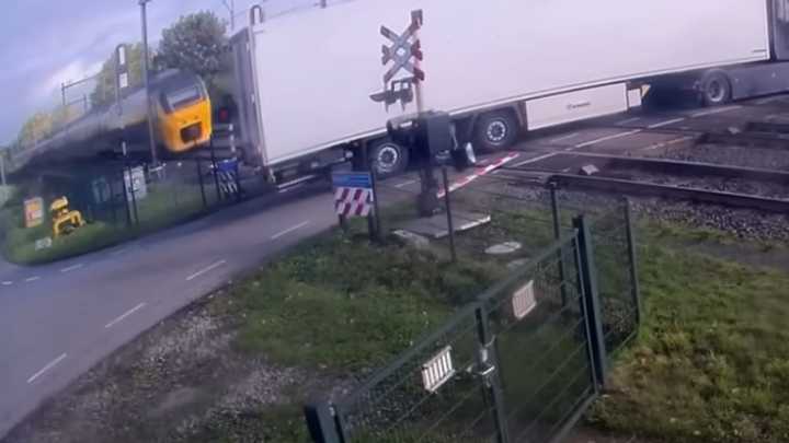 CCTV footage shows dramatic moment train crashes into lorry at level crossing