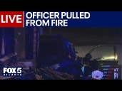 FOX 5 News Live: Officer pulled from fire after crashing into home