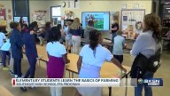 McCollom Elementary students get a lesson on farming at Southeast HS