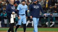 Jays' George Springer hit on knee by pitch; X