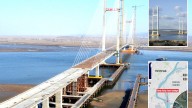 Two-mile ‘Bridge to Nowhere’ from China to North Korea abandoned so long that farmers dry crops on it could finally open
