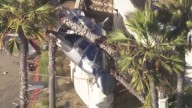 Dramatic footage of helicopter falling from the sky in Huntington Beach