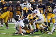 Shrine beats Our Lady of the Lakes 28-14 to stay in league race