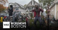 Homeowners hope elaborate Halloween displays survive rain, gusty winds