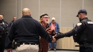 Police escort man from Juneau Assembly meeting after allegedly threatening city leaders
