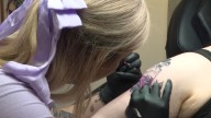 Legally blind Ohio artist says she can't drive, but she can tattoo