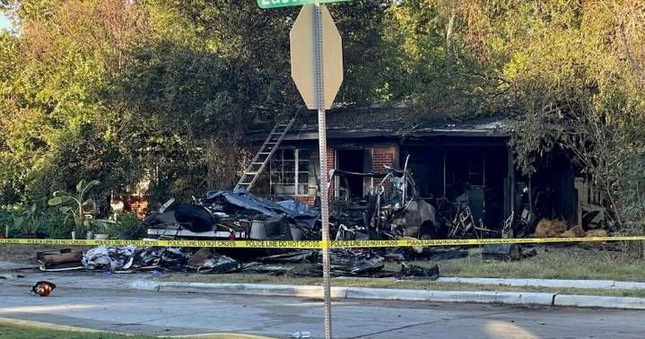 Woman, her dog found dead after RV fire outside Dallas home, authorities say