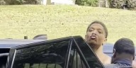WATCH: Derrick Groves blows kiss as he's loaded into Atlanta police unit
