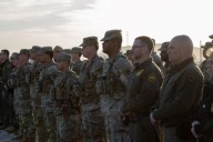 Texas National Guard lands in Chicago, sparking feuds between state leaders, Trump