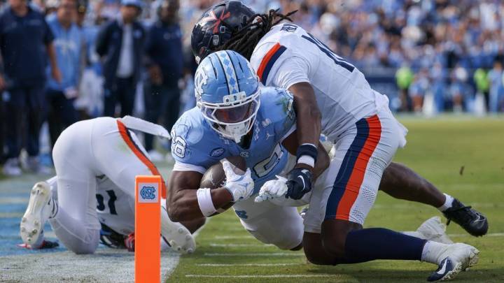 UNC falls short but shows improvement in OT loss to Virginia