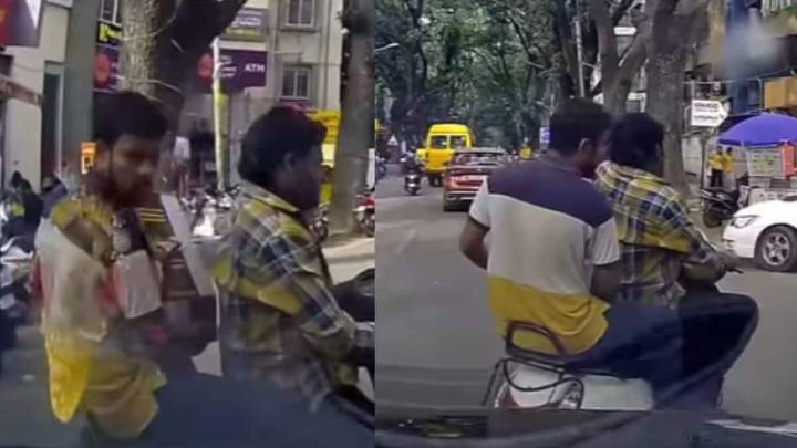 Bengaluru Scooty Rider Busy On Phone Didn’t See Car Approaching Towards Him...Cheats Death By Seconds