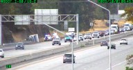 Flipped box truck causes slowing on eastbound I