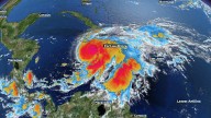 Hurricane Melissa develops as a Category 1, bringing dangerous rains and landslides to southern Caribbean