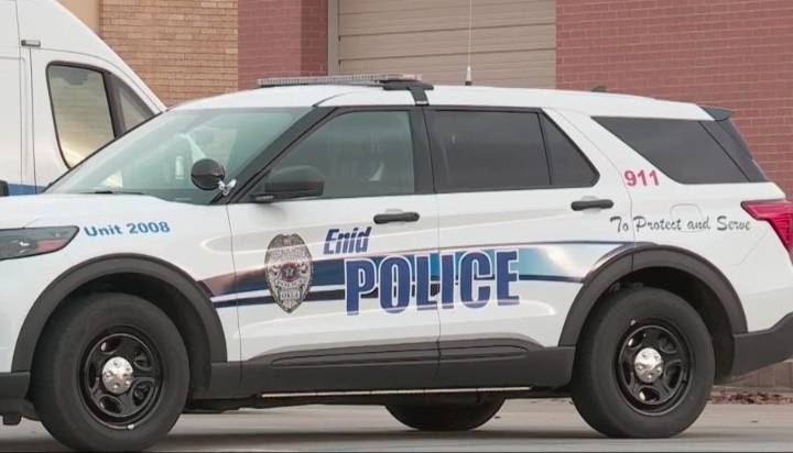Enid woman arrested after kids found locked in bedroom, police say