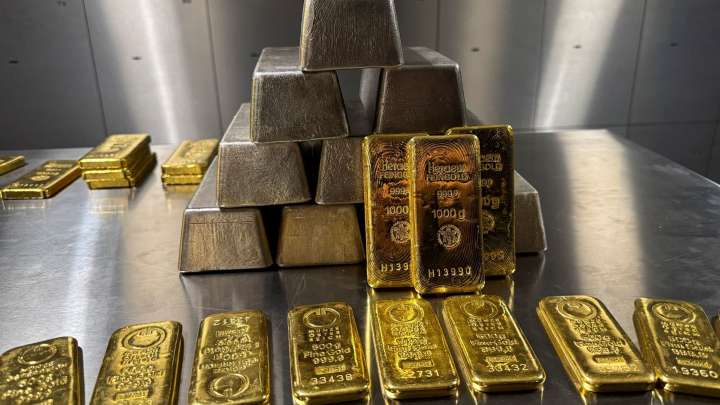 Gold and related stocks are falling for a second day