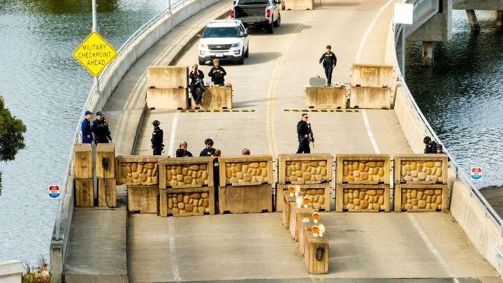 Shots fired, driver hurt and held after truck rams into Coast Guard base in California