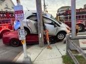 Car ends up atop another vehicle in Fall River crash