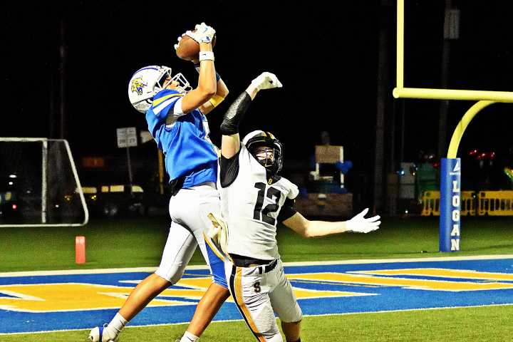 Photo gallery: Logan defeats Scott, 35