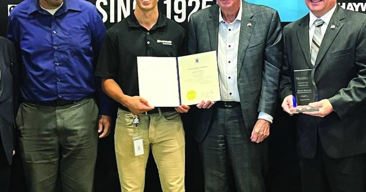 Officials celebrate milestone 15,000th employee at Quonset