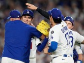 Ohtani hits 3 homers, strikes out 10 in Dodgers’ clinching NLCS win