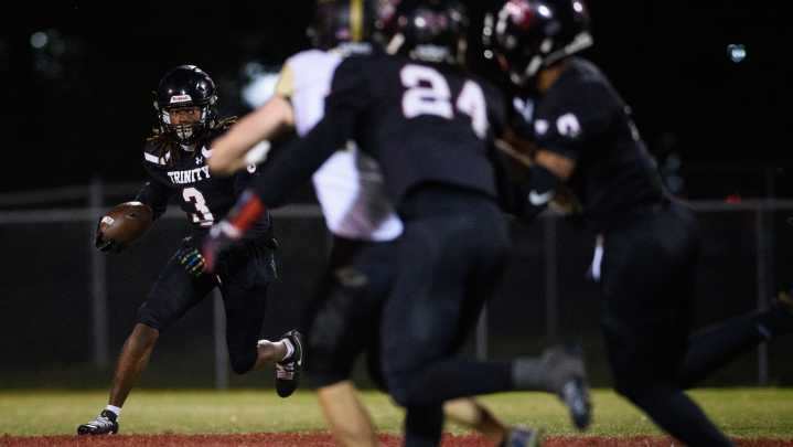 Check out the photos from Ravenscroft at Trinity Christian football