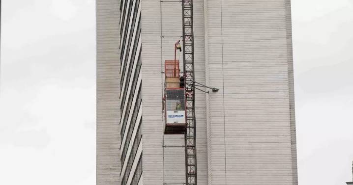 Emergency services scrambled to rescue people stuck in external lift at swanky Manchester city centre hotel