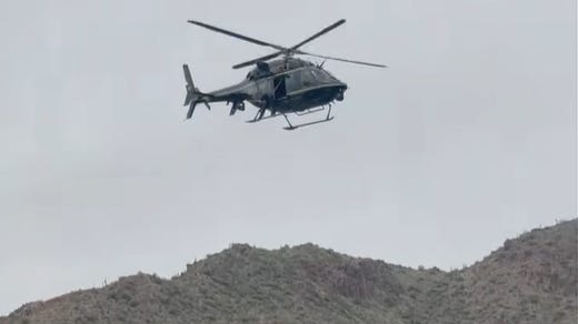 Deputies save father and son from being swept away at Salt River