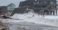 Beachfront houses collapsed into the Atlantic surf along North Carolina's Outer Banks